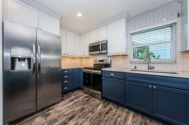 Interior, Kitchen, Recessed Lighting, Stainless Steel Appliances, Wood Texture Flooring