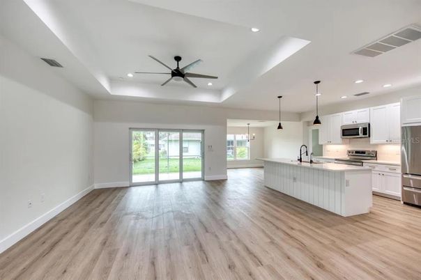 Interior, Kitchen, Pendant Lights, Recessed Lighting, Stainless Steel Appliances, Wood Texture Flooring
