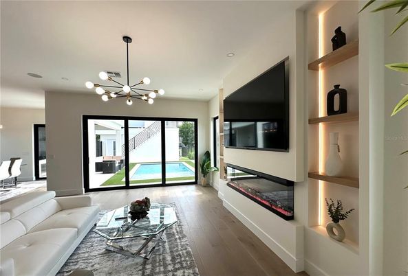 Fireplace, Interior, Living room, Pendant Lights, Recessed Lighting, Wood Texture Flooring