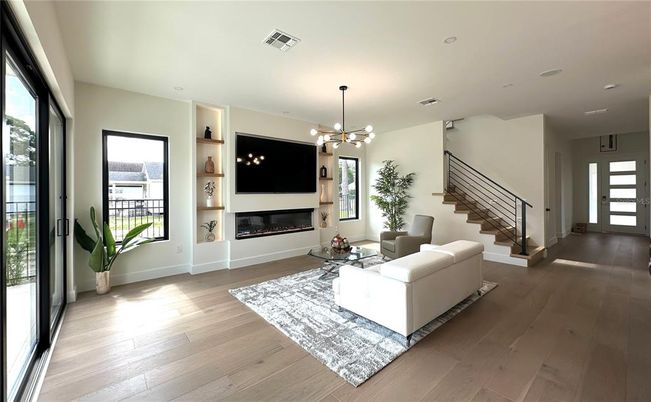 Fireplace, Interior, Living room, Pendant Lights, Recessed Lighting, Wood Texture Flooring