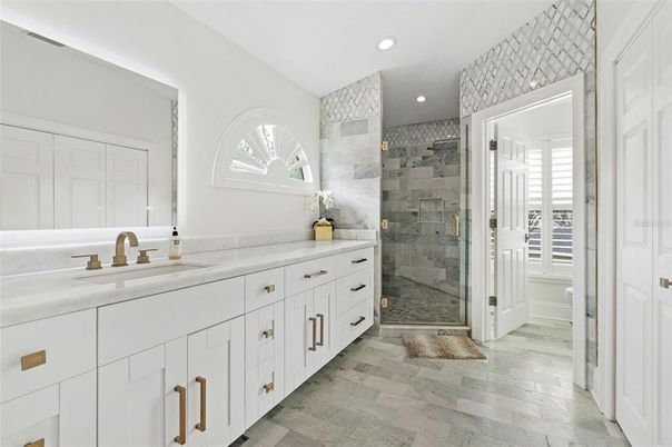 Bathroom, Dual Sink Vanities, Glass Shower, Interior, Recessed Lighting, Wood Texture Flooring