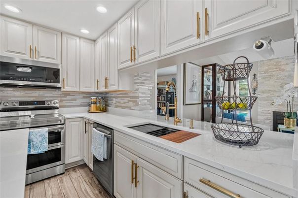 Interior, Kitchen, Recessed Lighting, Stainless Steel Appliances, Stone Walls, Wood Texture Flooring