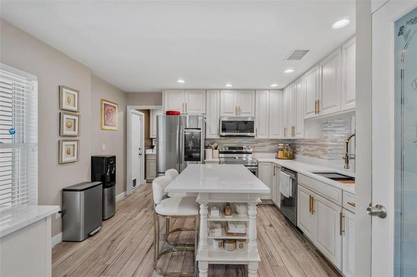 Interior, Kitchen, Recessed Lighting, Stainless Steel Appliances, Wood Texture Flooring