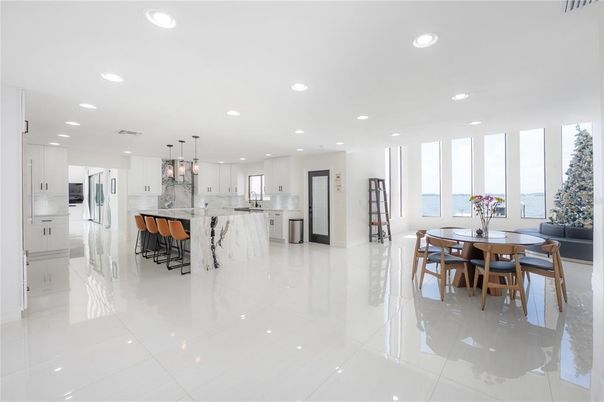 Dining room, Interior, Kitchen, Marble Walls, Pendant Lights, Recessed Lighting, Stainless Steel Appliances, Water