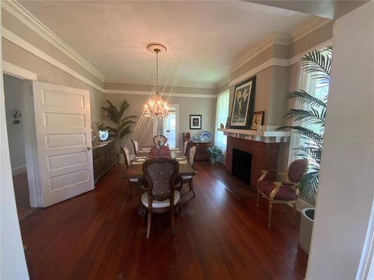 Chandelier, Dining room, Fireplace, Interior, Wood Texture Flooring