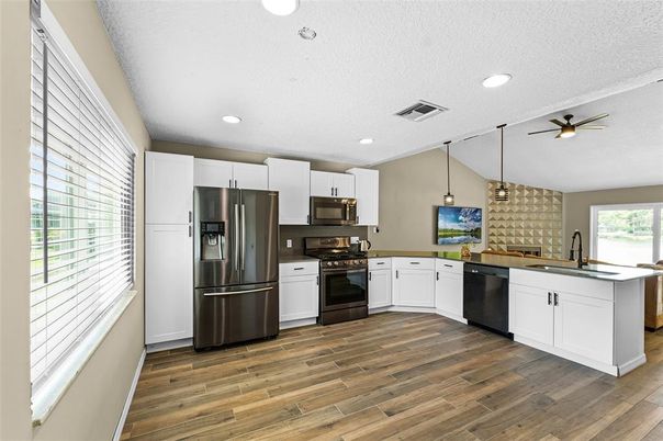 Interior, Kitchen, Pendant Lights, Recessed Lighting, Stainless Steel Appliances, Wood Texture Flooring