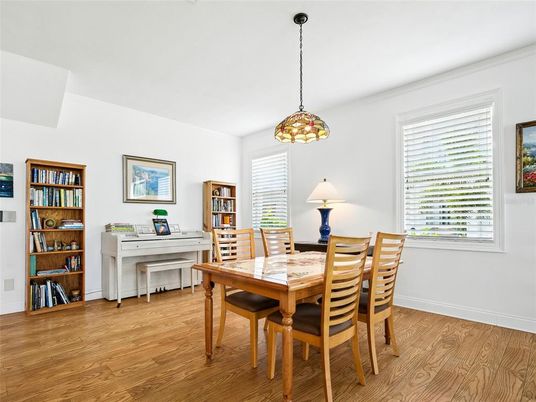 Dining room, Interior, Pendant Lights, Piano, Wood Texture Flooring