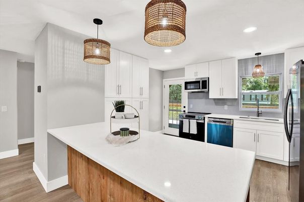 Interior, Kitchen, Pendant Lights, Recessed Lighting, Stainless Steel Appliances, Wood Texture Flooring