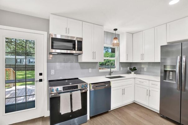 Interior, Kitchen, Pendant Lights, Recessed Lighting, Stainless Steel Appliances, Wood Texture Flooring