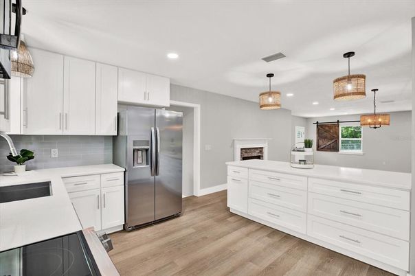 Interior, Kitchen, Pendant Lights, Recessed Lighting, Stainless Steel Appliances, Wood Texture Flooring