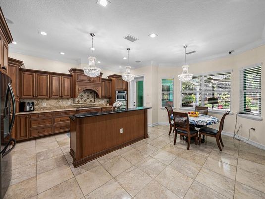 Chandelier, Dining room, Interior, Kitchen, Pendant Lights, Recessed Lighting, Stainless Steel Appliances
