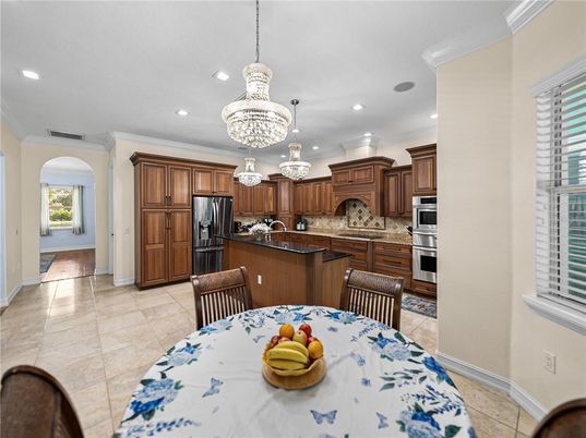 Chandelier, Dining room, Interior, Kitchen, Pendant Lights, Recessed Lighting, Stainless Steel Appliances