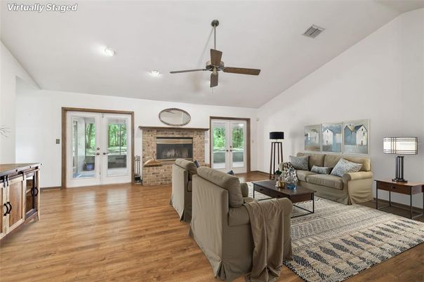 Fireplace, Interior, Living room, Recessed Lighting, Stone Walls, Wood Texture Flooring