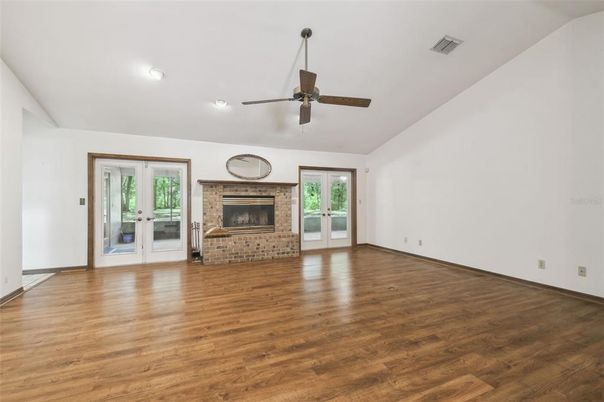 Empty room, Fireplace, Interior, Recessed Lighting, Wood Texture Flooring
