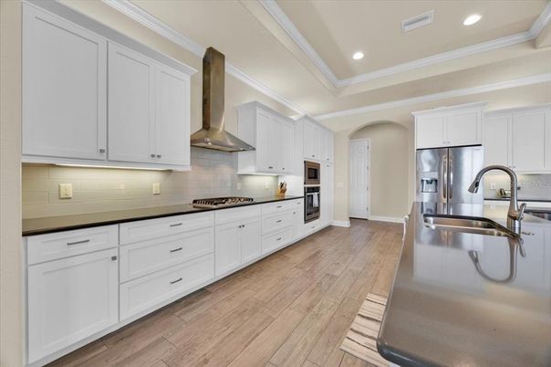 Interior, Kitchen, Recessed Lighting, Stainless Steel Appliances, Wood Texture Flooring