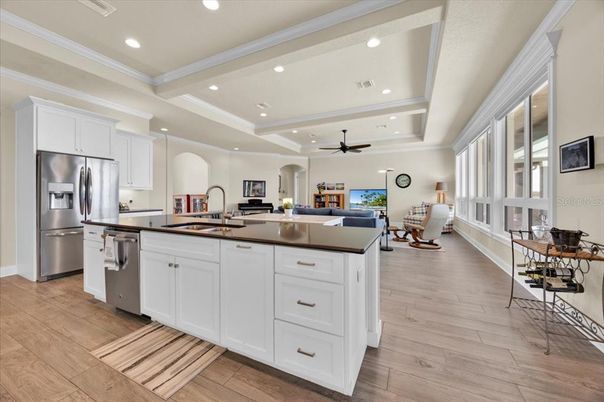 Dining room, Interior, Kitchen, Recessed Lighting, Stainless Steel Appliances, Wood Texture Flooring