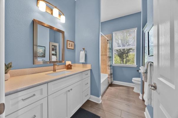 Bathroom, Dual Sink Vanities, Glass Shower, Interior, Wood Texture Flooring