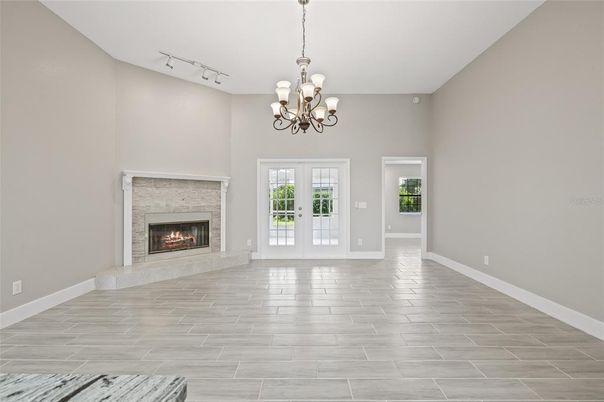 Chandelier, Empty room, Fireplace, Interior