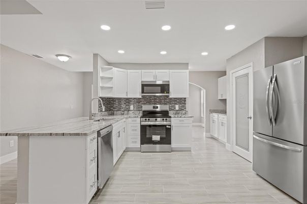 Interior, Kitchen, Recessed Lighting, Stainless Steel Appliances, Wood Texture Flooring