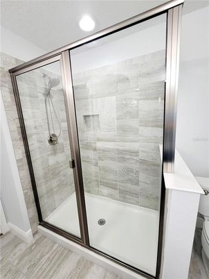 Bathroom, Glass Shower, Interior, Recessed Lighting, Wood Texture Flooring