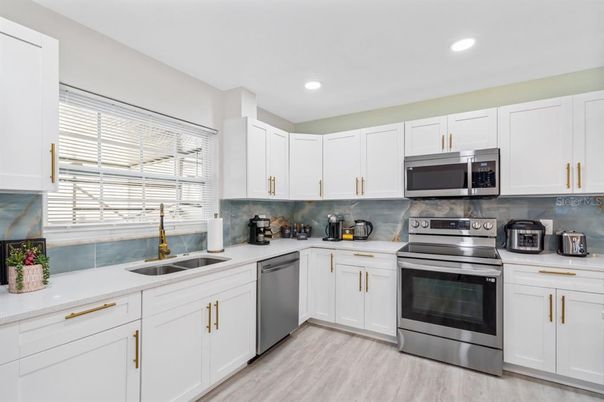 Interior, Kitchen, Recessed Lighting, Stainless Steel Appliances, Wood Texture Flooring