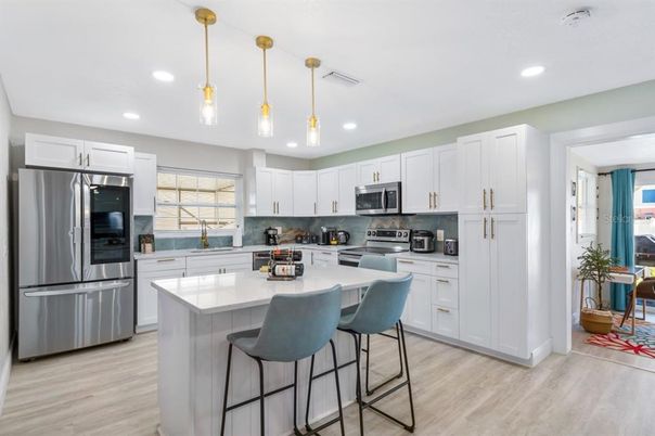 Interior, Kitchen, Pendant Lights, Recessed Lighting, Stainless Steel Appliances, Wood Texture Flooring