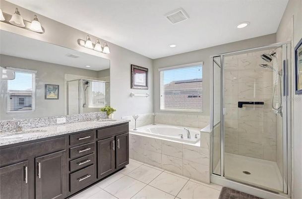 Bathroom, Dual Sink Vanities, Glass Shower, Interior, Marble, Marble Walls, Recessed Lighting