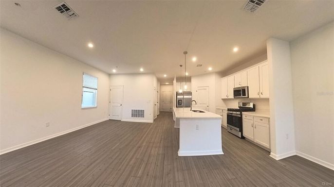 Interior, Kitchen, Pendant Lights, Recessed Lighting, Stainless Steel Appliances, Wood Texture Flooring