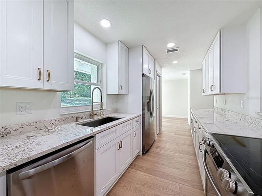 Interior, Kitchen, Recessed Lighting, Stainless Steel Appliances, Wood Texture Flooring