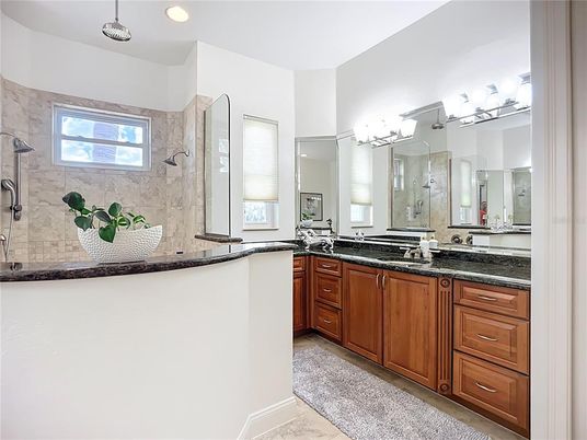 Bathroom, Dual Sink Vanities, Glass Shower, Interior, Marble Walls, Recessed Lighting