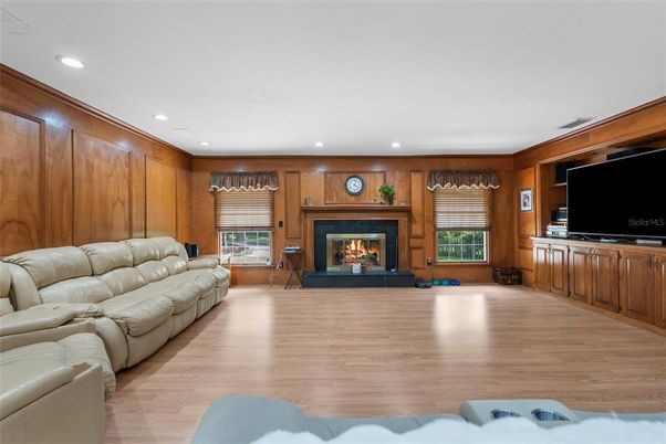 Fireplace, Interior, Living room, Recessed Lighting, Wood Texture Flooring, Wooden Walls
