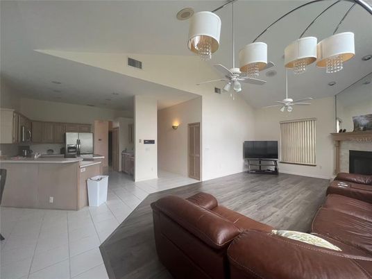 Fireplace, Interior, Kitchen, Living room, Stainless Steel Appliances, Wood Texture Flooring