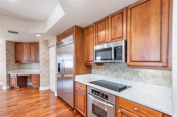 Interior, Kitchen, Recessed Lighting, Stainless Steel Appliances, Wood Texture Flooring