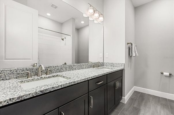 Bathroom, Dual Sink Vanities, Interior, Recessed Lighting, Wood Texture Flooring