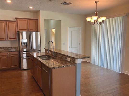 Chandelier, Interior, Kitchen, Recessed Lighting, Stainless Steel Appliances, Wood Texture Flooring