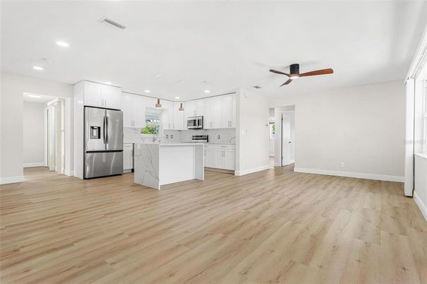 Interior, Kitchen, Recessed Lighting, Stainless Steel Appliances, Wood Texture Flooring