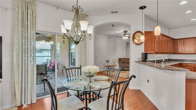 Chandelier, Dining room, Interior, Pendant Lights, Recessed Lighting, Wood Texture Flooring
