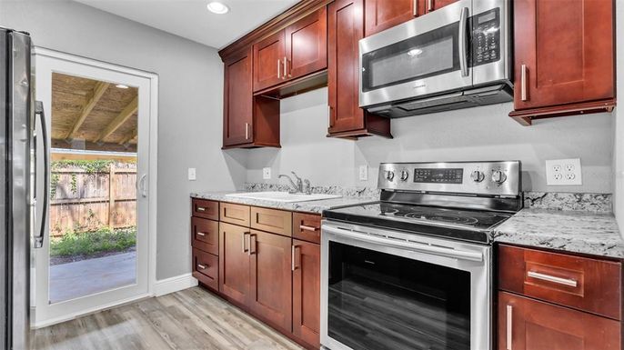 Interior, Kitchen, Recessed Lighting, Stainless Steel Appliances, Wood Texture Flooring