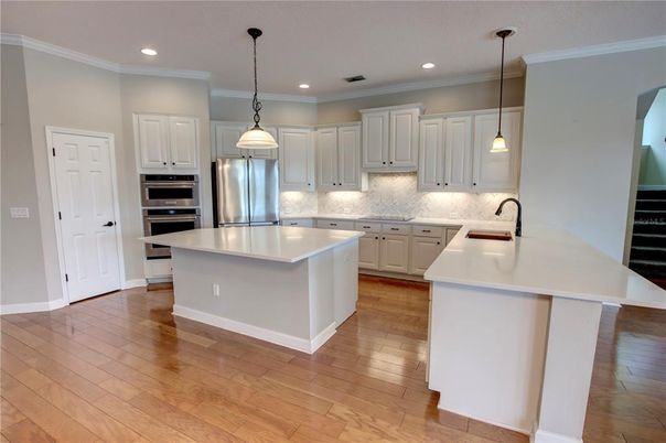 Interior, Kitchen, Pendant Lights, Recessed Lighting, Stainless Steel Appliances, Wood Texture Flooring