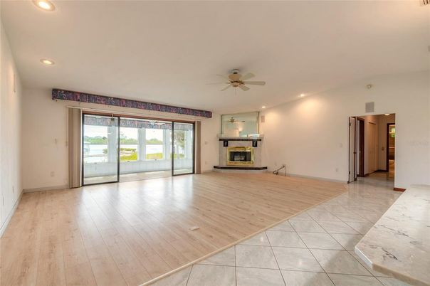 Empty room, Fireplace, Interior, Recessed Lighting, Wood Texture Flooring