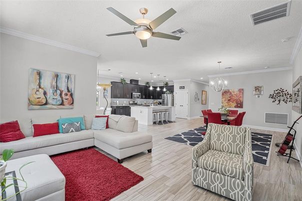 Chandelier, Dining room, Interior, Kitchen, Pendant Lights, Recessed Lighting, Stainless Steel Appliances, Wood Texture Flooring