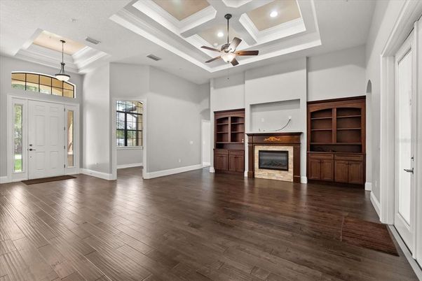 Empty room, Fireplace, Interior, Pendant Lights, Recessed Lighting, Wood Texture Flooring