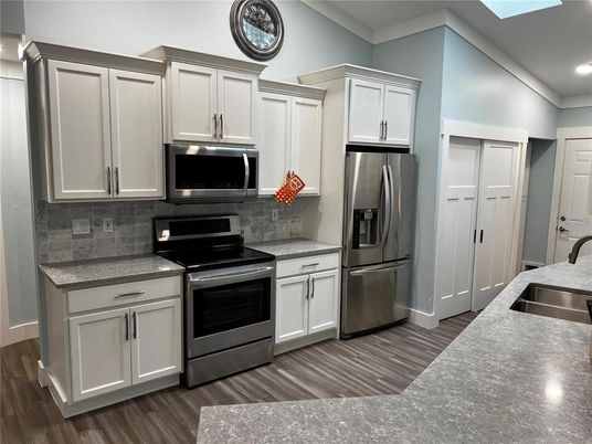 Interior, Kitchen, Recessed Lighting, Stainless Steel Appliances, Wood Texture Flooring