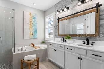 Bathroom, Dual Sink Vanities, Glass Shower, Interior, Recessed Lighting, Wood Texture Flooring