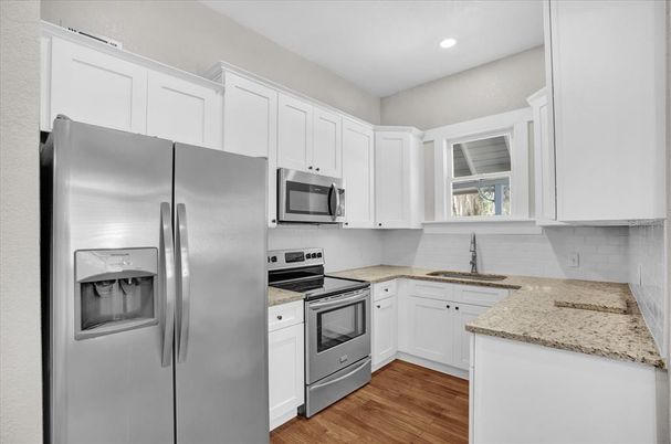 Interior, Kitchen, Recessed Lighting, Stainless Steel Appliances, Wood Texture Flooring