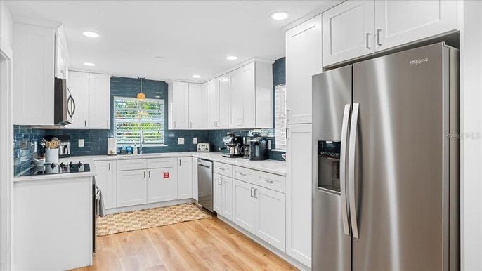 Interior, Kitchen, Recessed Lighting, Stainless Steel Appliances, Wood Texture Flooring