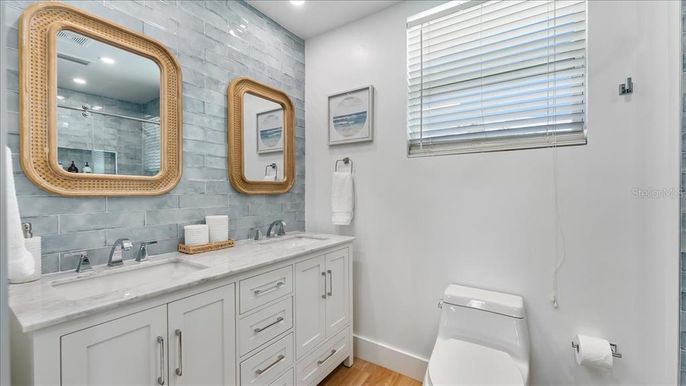 Bathroom, Dual Sink Vanities, Interior, Recessed Lighting, Wood Texture Flooring