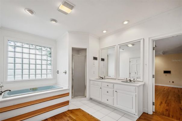 Bathroom, Dual Sink Vanities, Interior, Recessed Lighting, Wood Texture Flooring