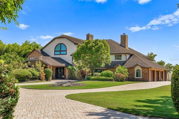 Attached, Backyard, Exterior, Facade, Brick Facade, Tudor Revival