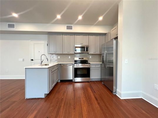 Interior, Kitchen, Recessed Lighting, Stainless Steel Appliances, Wood Texture Flooring